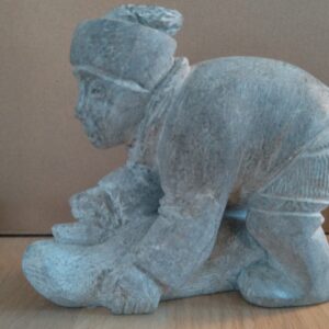 Inuit Woman with Seal and Ulu - 990